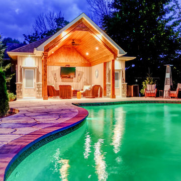 A Pool with a Countryside View