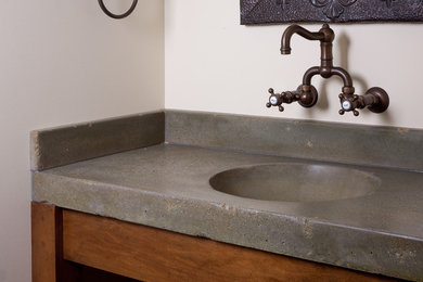 Bathroom - rustic bathroom idea in Other with concrete countertops