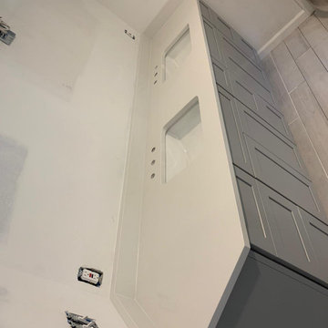 Kitchen Remodeled With White Marble Cook Top & Cabinets With Square Sink