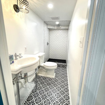 Basement Bathroom Addition with Custom Storage Shelves