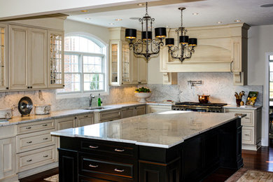 Inspiration for a mid-sized transitional l-shaped open concept kitchen remodel in Other with granite countertops, white backsplash, granite backsplash, an island and white countertops