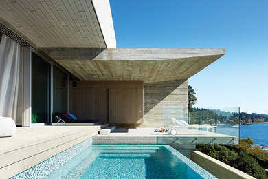 Inspiration for an expansive modern grey exterior in Vancouver.