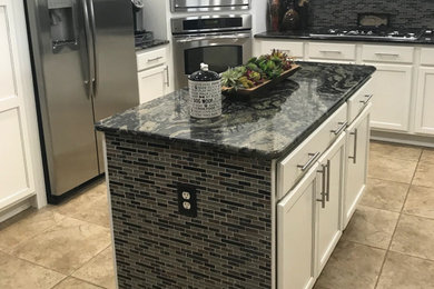 Example of a mountain style kitchen design in Miami