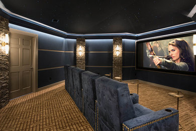 Inspiration for a contemporary carpeted home theater remodel in DC Metro with a projector screen