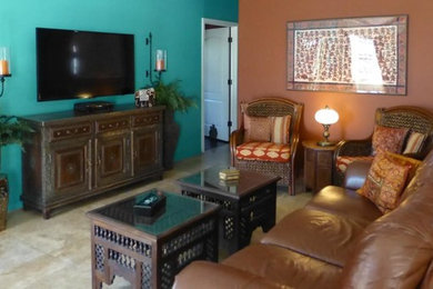 Photo of a large asian open concept living room in Phoenix with brown walls, no fireplace and a wall-mounted tv.