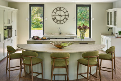 Design ideas for a medium sized traditional kitchen in Sussex with shaker cabinets, quartz worktops and multiple islands.