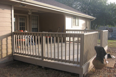 Mid-sized backyard deck photo in Austin with no cover