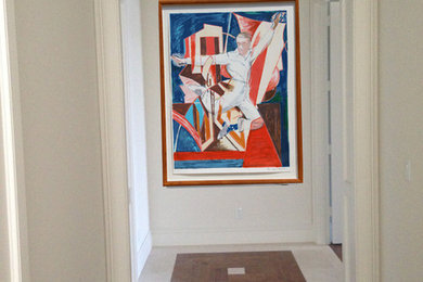Inspiration for a contemporary hallway remodel in Other with beige walls