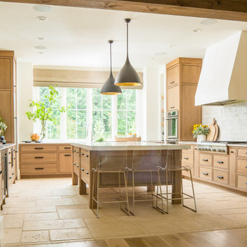 California Modern Mediterranean Kitchen with Limestone Floors & Warm Wood Cabine