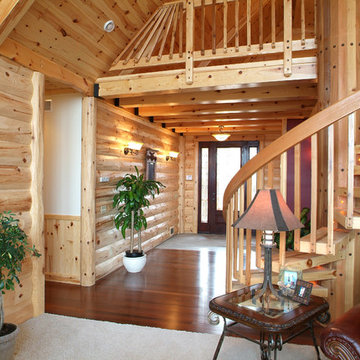 Half log siding and pre-finished knotty pine paneling