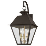 Livex Lighting - Wentworth 3 Light Bronze/Antique Brass Finish Cluster Outdoor Large Wall Lantern - With its appealing bronze finish and clear glass, the stunning Mansfield collection will make an elegant addition to any outdoor space. Formed from solid brass & traditionally inspired, this downward hanging three-light outdoor large wall lantern is perfect for a back porch or entry way. Combining superb craftsmanship and affordable price, this fixture is sure to be a timeless addition to your home.