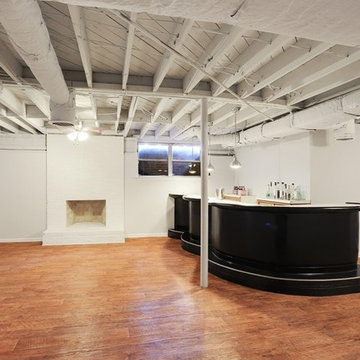 Basement with Exposed Ceiling in Historic Collier Heights Home