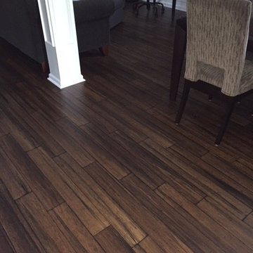 After - the carpet is gone and the new floors shine!