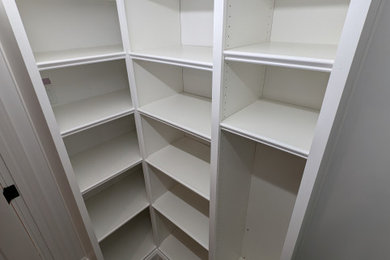 Example of a trendy closet design in Boston