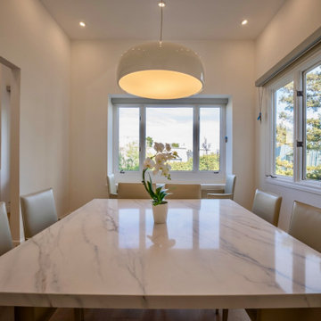 Dining Table and Corner Window Outlook