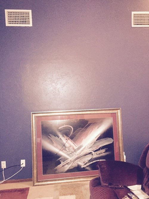 How high to hang painting on vaulted ceiling?