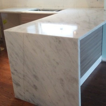 3 cm super white quartzite with book matched waterfall edge