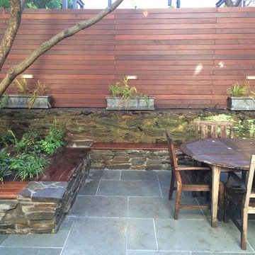 bluestone pavers, ipe bench seating, stone wall/seating, ipe fencing