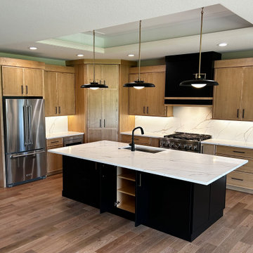 Maple Pecan Stain and Painted Black Kitchen Design in Bettendorf, Iowa