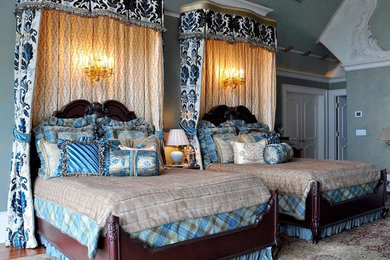 Huge elegant master medium tone wood floor and brown floor bedroom photo in Jacksonville with gray walls and no fireplace