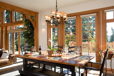 Mountain style slate floor great room photo in Seattle with white walls