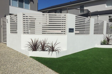 brick and render front fence and garden beds