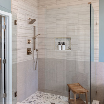 Spa Like Primary Bathroom Remodel with Warm Wood & Brass Details