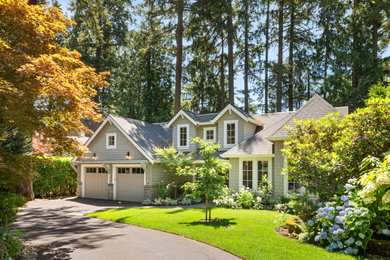 Mid-sized transitional two-story house exterior idea in Portland
