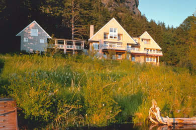 Inspiration for a large transitional beige two-story exterior home remodel in Seattle