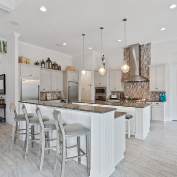 Large White Kitchen With Double Islands