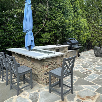Outdoor Kitchen with Fire Feature & Beer Tap and Flagstone Patio