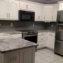 Grey and white kitchen and dining room