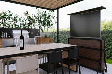 LOutdoor kitchen patio with hidden TV lift cabinet