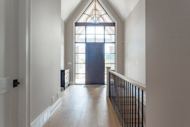 Example of a transitional entryway design in Other