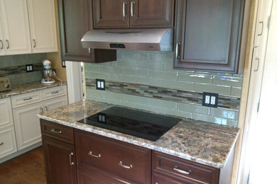 Example of a transitional kitchen design in New York