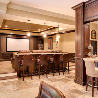 Photo of a medium sized traditional enclosed home cinema in Indianapolis with beige walls, carpet and a wall mounted tv.