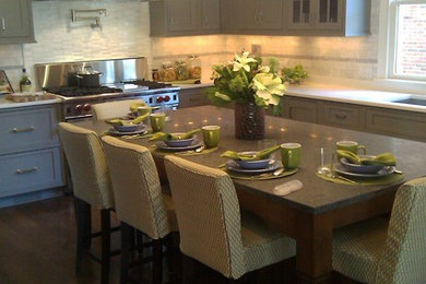Inspiration for a mid-sized eclectic dark wood floor and brown floor enclosed dining room remodel in Chicago with white walls