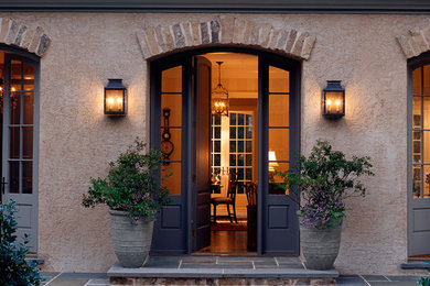 Inspiration for a mid-sized timeless entryway remodel in DC Metro with a black front door