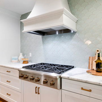 Scalloped Seafoam Tile Backsplash with Custom Hood and Café Range
