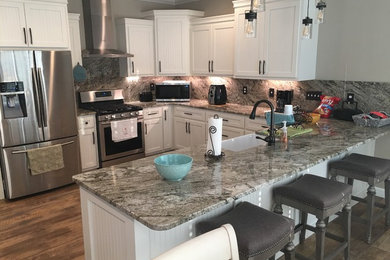 Kitchen - kitchen idea in Other with granite countertops