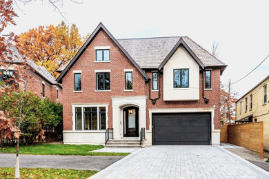 Example of an exterior home design in Toronto