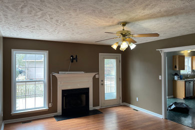 Example of an arts and crafts family room design in Raleigh
