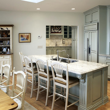 Traditional Kitchen With Blue Raised Panel Cabinets With Brown Glaze
