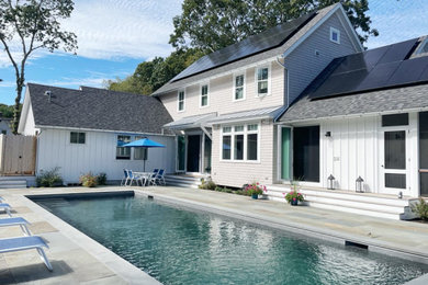 Mid-sized coastal white two-story mixed siding and shingle exterior home idea in Providence with a shingle roof and a gray roof