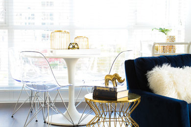 Inspiration for a small contemporary medium tone wood floor dining room remodel in Vancouver with gray walls