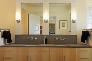 Mid-sized transitional master slate floor corner shower photo in Seattle with an undermount sink, flat-panel cabinets, light wood cabinets, a one-piece toilet and beige walls