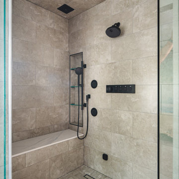 Bathroom Remodel in Sterling, VA Tub, glass shower, double vanity, stone wall