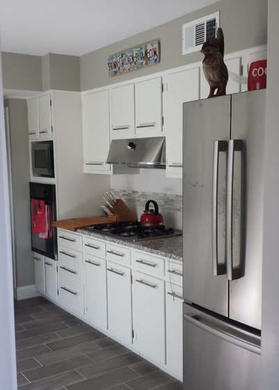 Rich Walnut and Clean White Form An Entertaining Kitchen