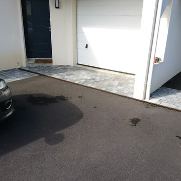 Création d'un carport, d'une cour & d'une terrasse