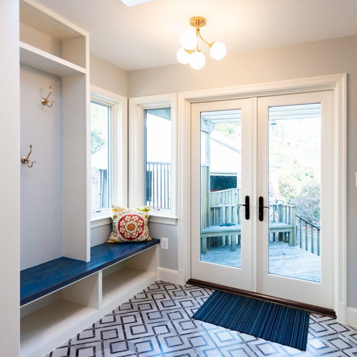 The former breakfast room was converted to a new Mudroom with storage space and a stunning floor tile.
